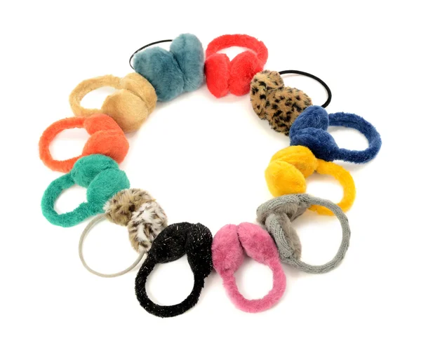 Cute colorful earmuffs arranged in a circle. — Stock Photo, Image
