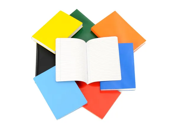 Close up on various books and a opened blank notebook. — Stock Photo, Image