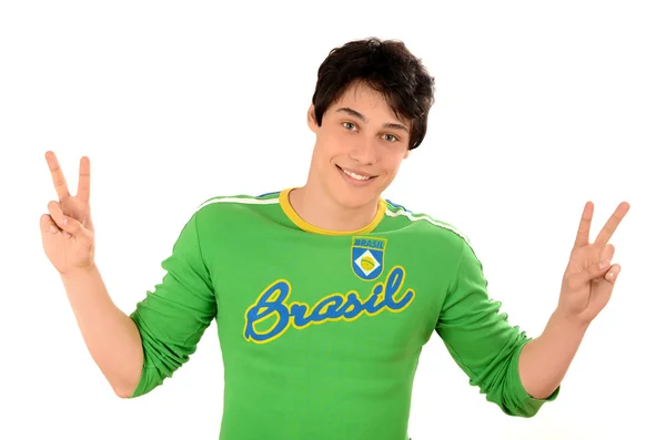 Brazilian man signing victory for Brazil. — Stock Photo, Image