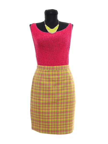 Pink blouse and neon yellow plaid skirt on mannequin. — Stock Photo, Image