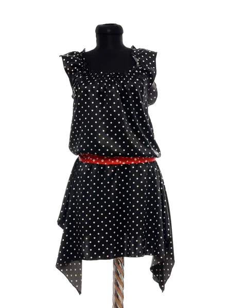 Polka dots dress with red belt on mannequin. — Stock Photo, Image