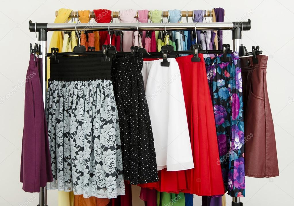 Cute summer skirts displayed on a rack.