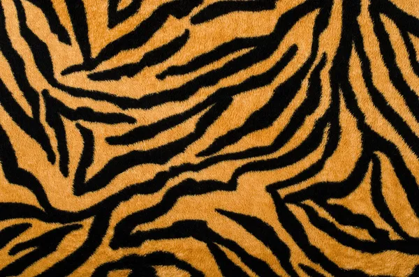 Padrão de tigre marrom e preto. Pele animal print como fundo . — Fotografia de Stock