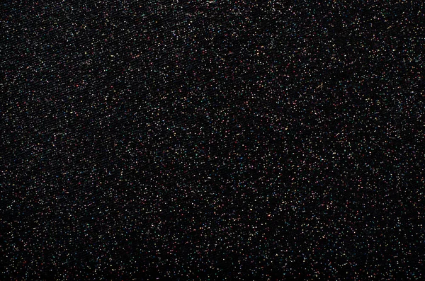 Μαύρο φόντο με πολύχρωμο αστράφτει. αφρώδη μοτίβο. — Φωτογραφία Αρχείου