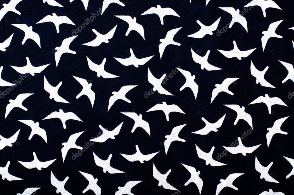 Seagulls navy pattern. Dark blue and white seagull print as background.