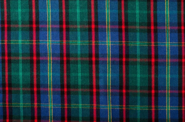 Schottisches Schottenmuster. roter, blauer und grüner karierter Druck als Hintergrund. — Stockfoto