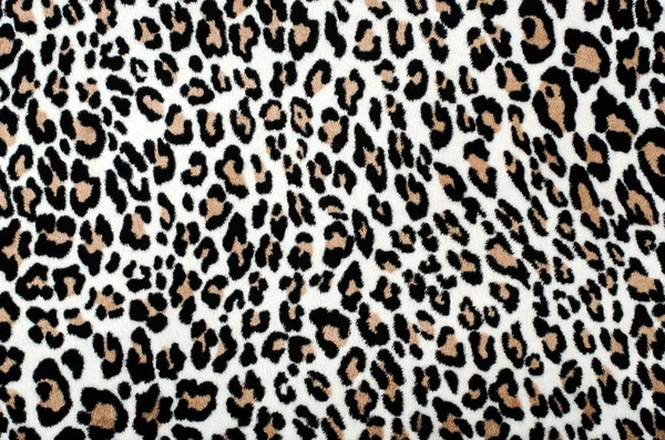 Коричневого і чорного leopard візерунок. хутро тварина друку як тло. Ліцензійні Стокові Фото