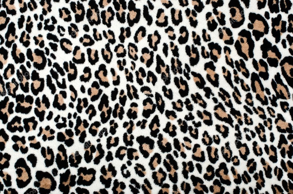 Brown and black leopard pattern. Fur animal print as background.