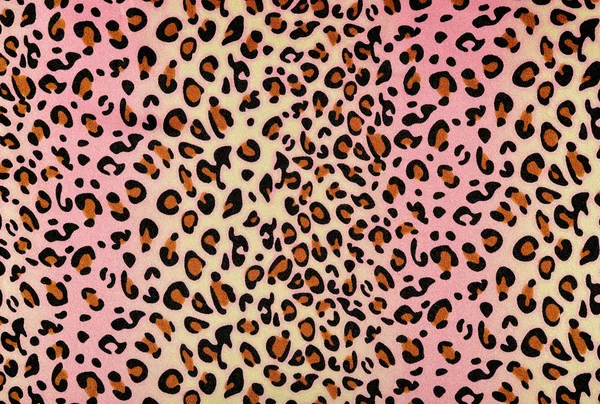 Brown leopard pattern on pink and yellow stripes. Animal print as background. — Stock Photo, Image