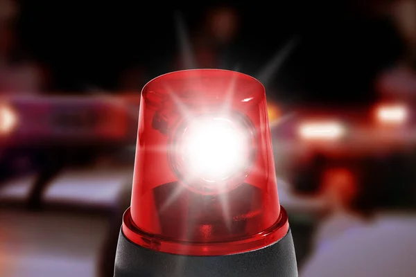 Acil durum ışıklarıyla yanıp sönen ışık arka planı olan kırmızı ışık itfaiyesi sireni.