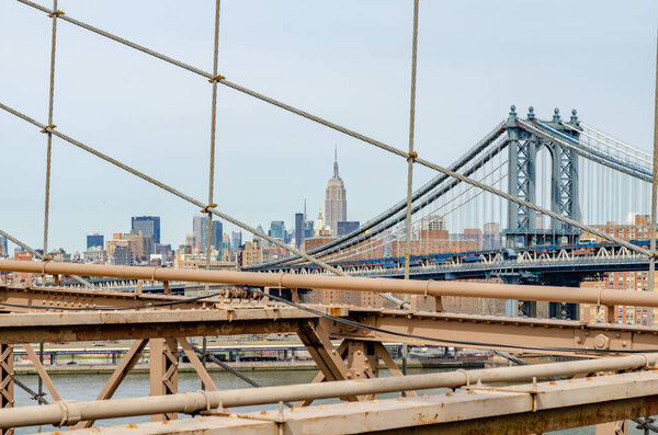 Manhattan Bridge with Brooklyn Bridge in forefront, New York City