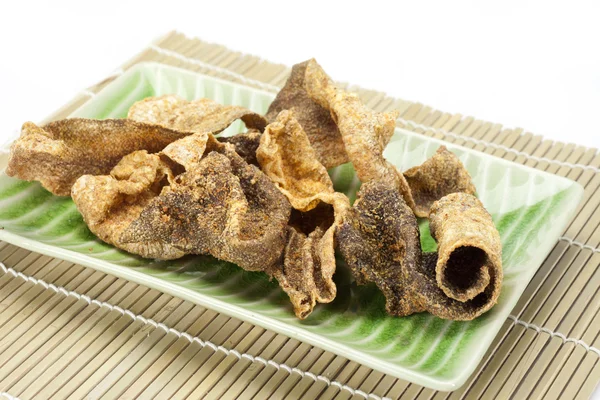 Crispy fried fish Skin with spices — Stock Photo, Image