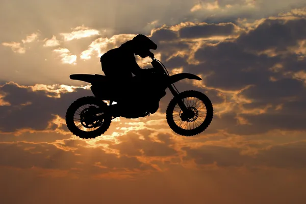 Silhouette Motocross salto — Foto Stock