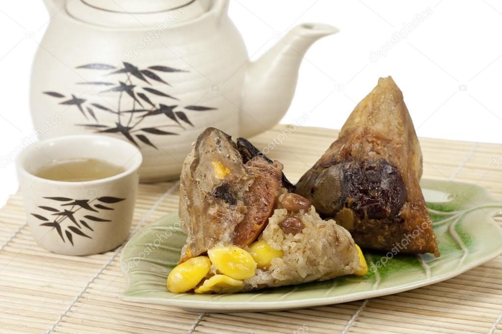 Rice dumplings or zongzi with tea