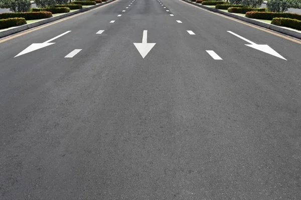 Traffic symbol on surface road — Stock Photo, Image