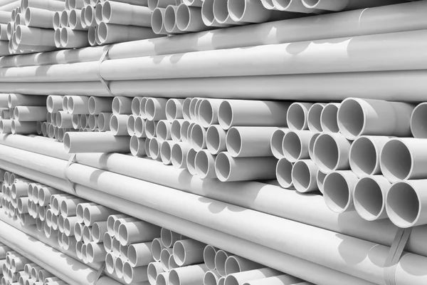 PVC pipes stacked in construction site — Stock Photo, Image