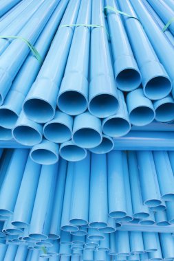 PVC pipes staked in construction site clipart