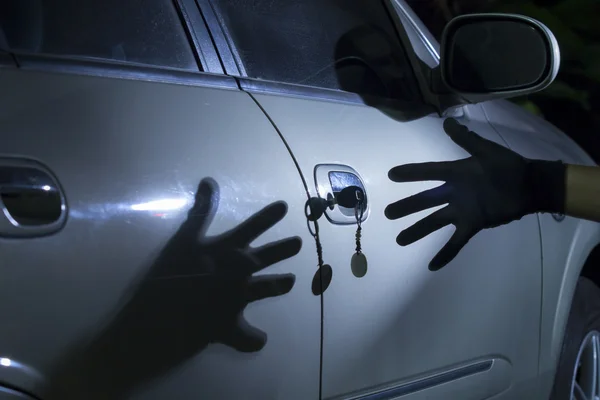 Car thief at parking lot — Stock Photo, Image