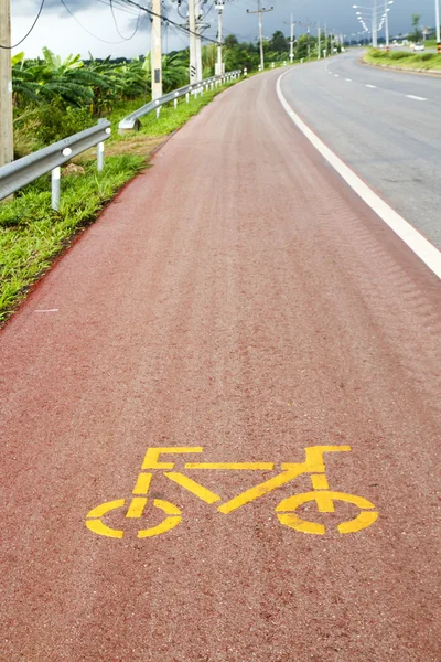 Sinal de ciclovia na estrada — Fotografia de Stock