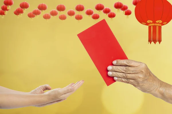Grandmother Hand Giving Red Envelope Hongbao Kids Chinese New Year — 图库照片