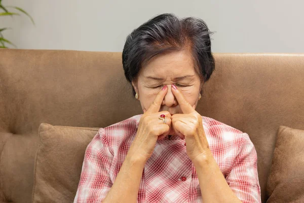 Senior Asian Woman Has Eyestrain Fatigue — Stockfoto