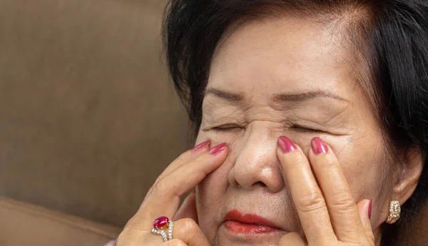 Senior Asian Woman Has Eyestrain Fatigue — Stockfoto