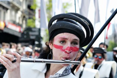 Unidentified participant plays in a composition during Zinneke Parade on May 19, 2012 in Brussels clipart