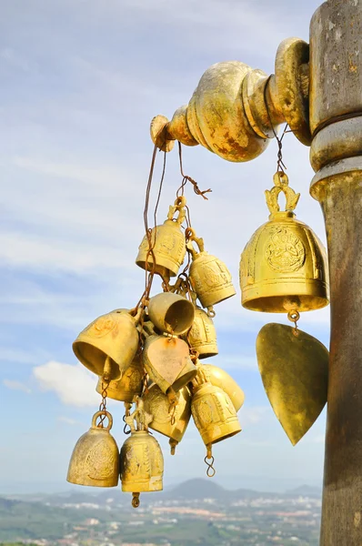 Bells on entry in buddhist temple in Thailand in evening — Stock Photo, Image