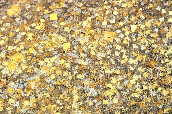 Leaves of gold offered to Buddha by praying in Thailand as background image — Stock Photo, Image