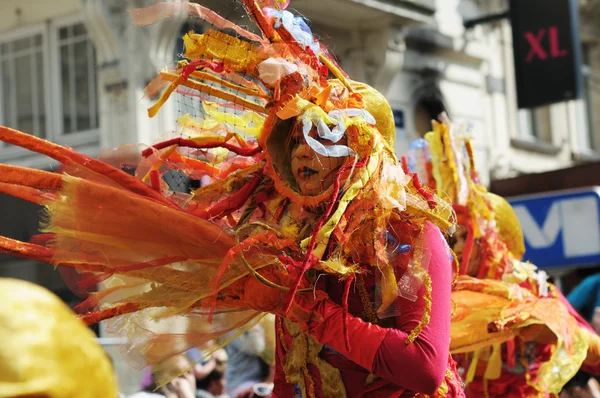 Unknown participant shows costume of mystic creature during Zinneke Parade on May 19, 2012 in Brussels — Stock Photo, Image