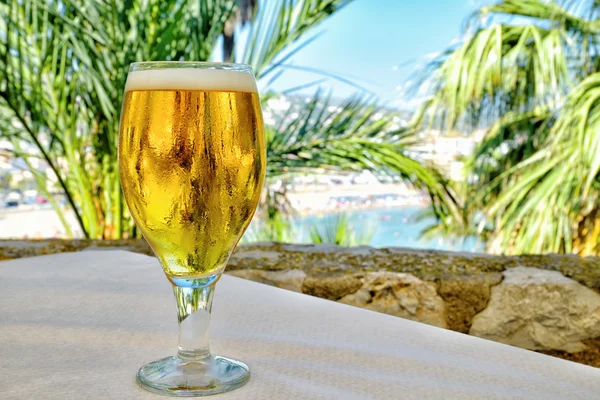 Cold beer on table — Stock Photo, Image