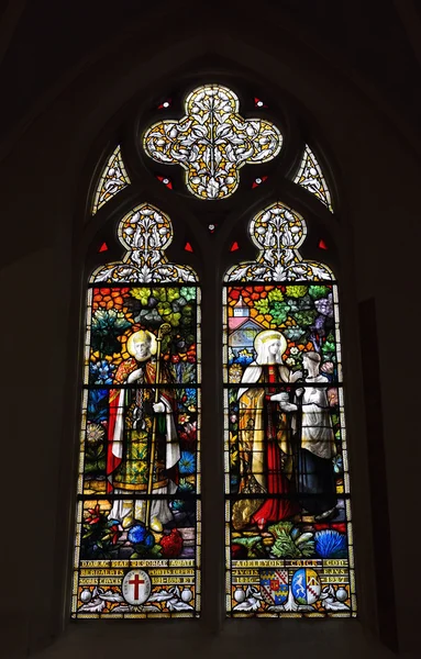 Stained glass window in neogothic Saint Barbara Church — Stock Photo, Image