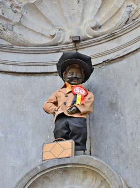 Manneken Pis awarded costume dedicated to 50 anniversary of Turkish workers immigration to Belgium clipart