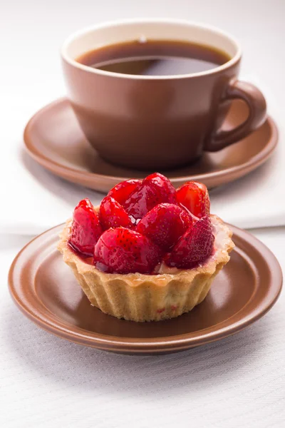 Cup of Tea on White Napkin with Strawberry dessert — Stock Photo, Image