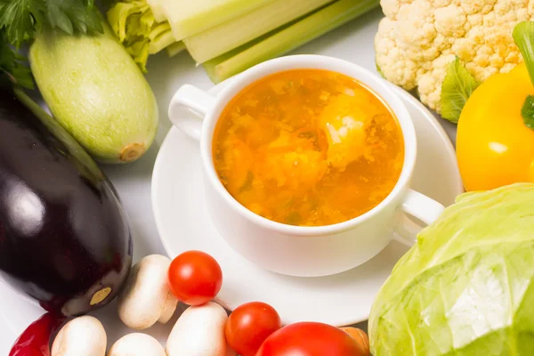 Bowl of Soup with Fresh Vegetables around — Stock Photo, Image