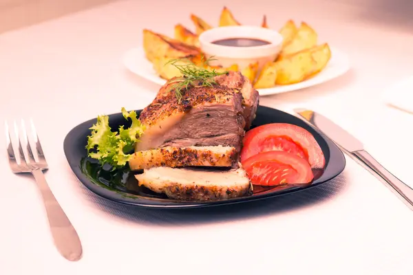 Baked Meat with Grilled Potato on white table — Stock Photo, Image