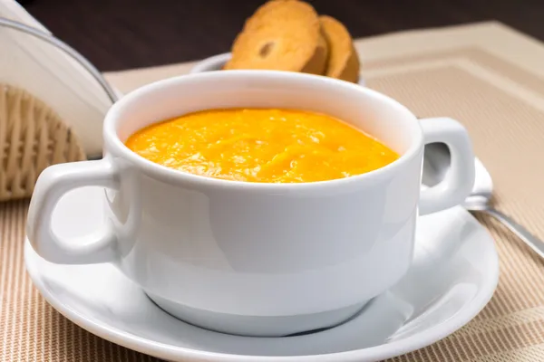 Sweet Pumpkin porridge in white bowl at the table — Stock Photo, Image