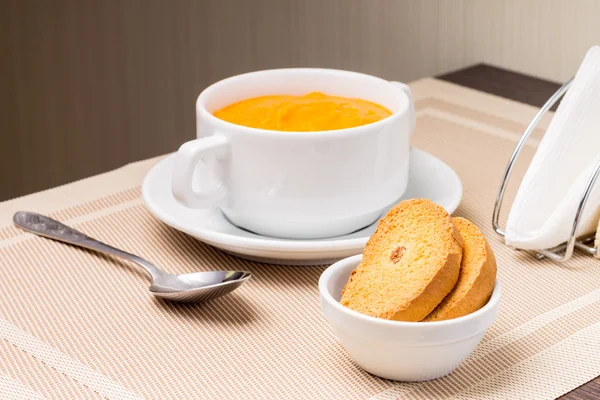 Sweet Pumpkin porridge in white bowl at the table — Stock Photo, Image