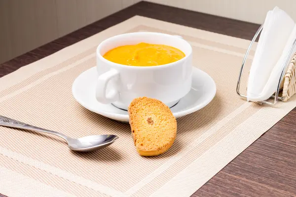 Sweet Pumpkin porridge in white bowl at the table — Stock Photo, Image
