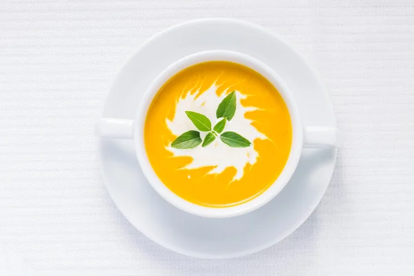 Pumpkin soup on served table. Top view — ストック写真