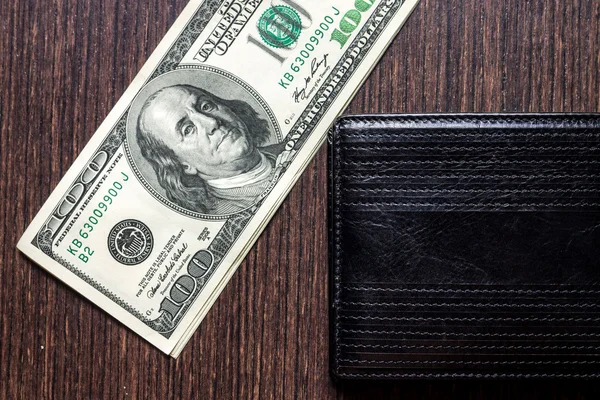 Money with leather wallet on table — Stock Photo, Image