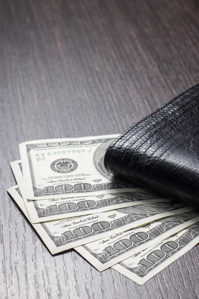 Money with leather wallet on table — Stock Photo, Image