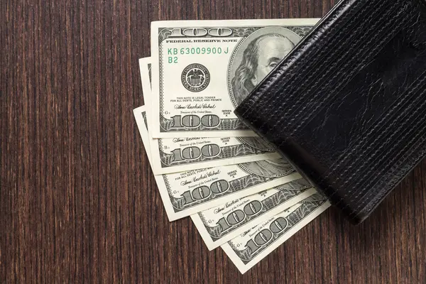 Money with leather wallet on table — Stock Photo, Image