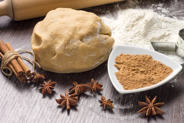 Dough and flour with spices on board — Stock Photo, Image