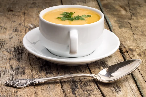 Vegetarian food. Pea soup with silver spoon — Stock Photo, Image