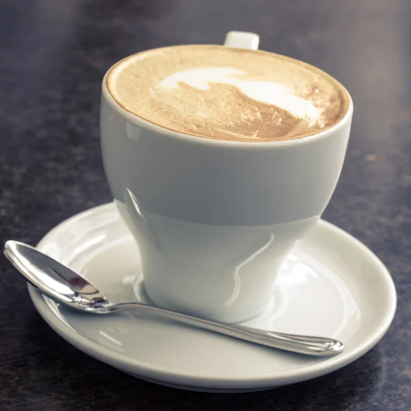 Cup of Cappuccino served in cafe — Stock Photo, Image