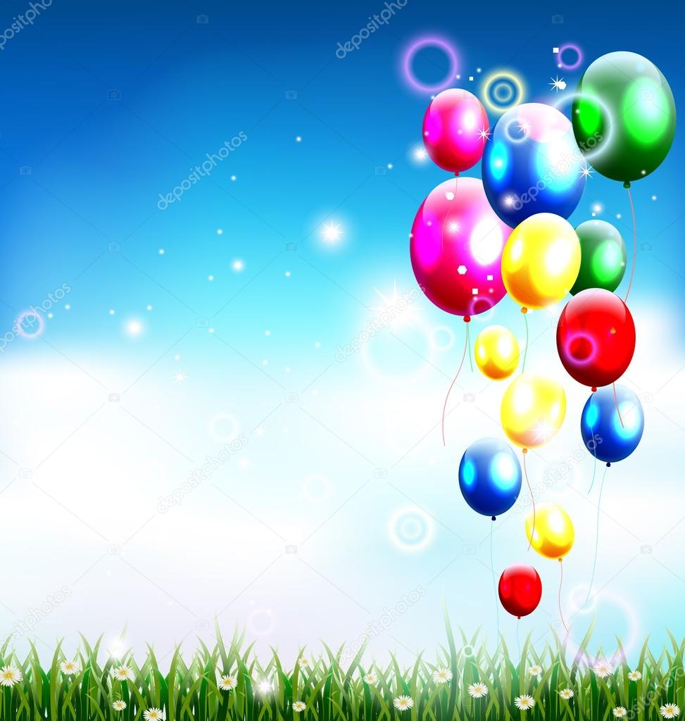 Balloons under blue sky and beauty grass