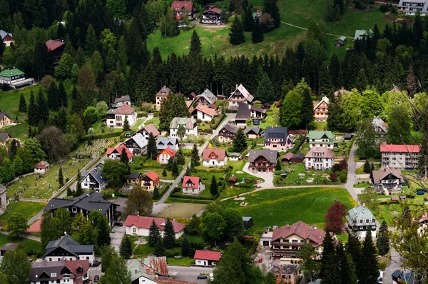 Aerial view of houses in mountain — Stock Photo, Image