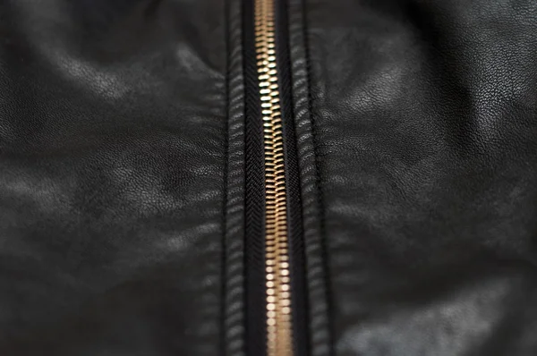 Cierre de cremallera en material de cuero negro — Foto de Stock