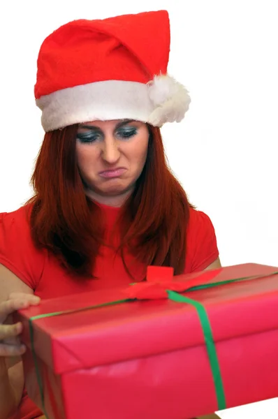 Boże Narodzenie prezent - prezent otwarcia kobieta rozczarowany i niezadowolony — Zdjęcie stockowe